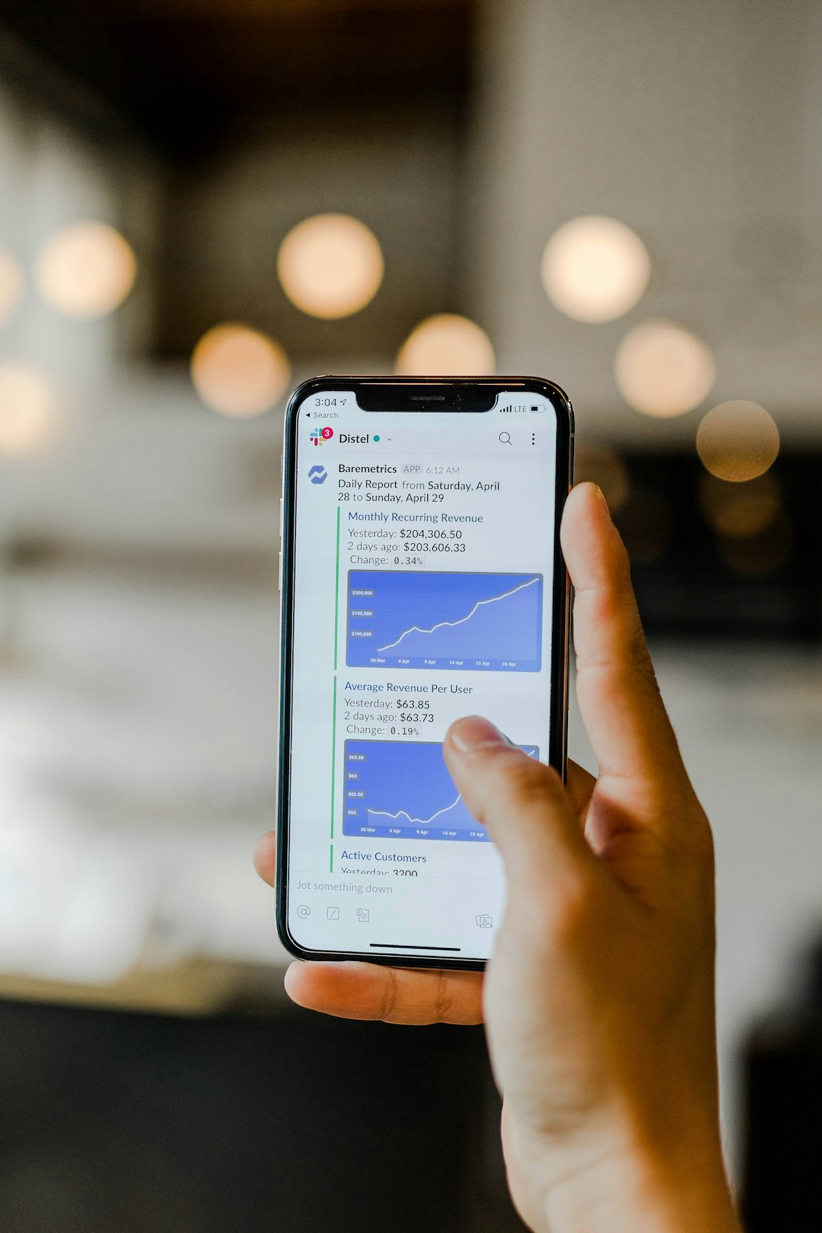 Person reading a campaign text message on a phone
